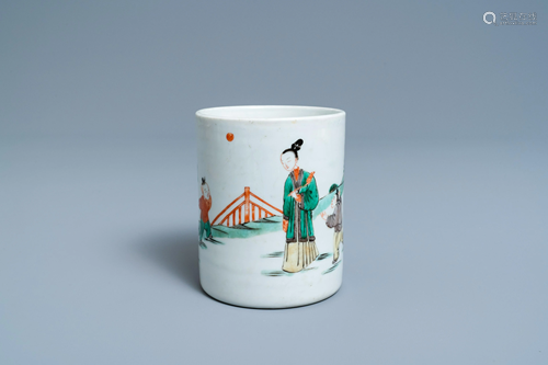 A Chinese famille verte brush pot with figures in a