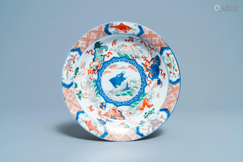 A Chinese famille verte dish with a carp surrounded by