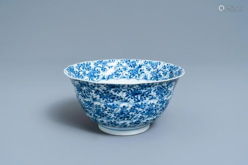 A Chinese blue and white molded bowl with floral