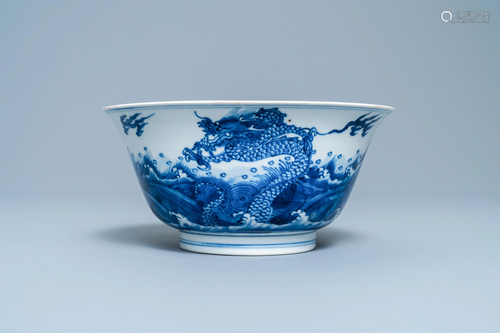 A Chinese blue and white 'dragon and carps' bowl,