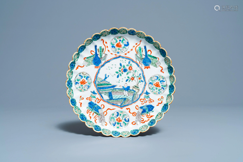 A lobed Chinese famille verte dish with a boy, Kangxi