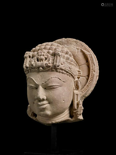 A SANDSTONE HEAD OF SHIVA CENTRAL INDIA, CIRCA 11TH CENTURY