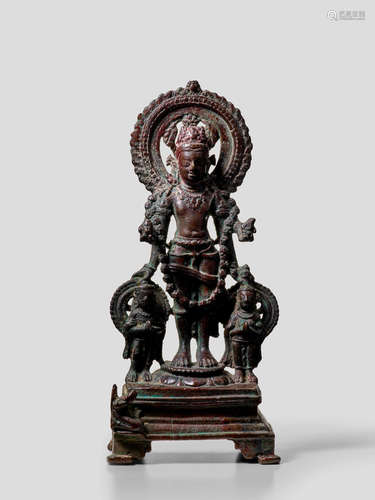 A COPPER ALLOY FIGURE OF VISHNU WITH GADANARI AND CHAKRAPURUSHA NORTHEASTERN INDIA, BIHAR, PALA PERIOD, 9TH CENTURY