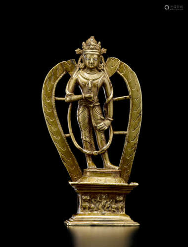 A SILVER INLAID BRASS FIGURE OF VAJRAPANI  KASHMIR, CIRCA 11TH CENTURY 