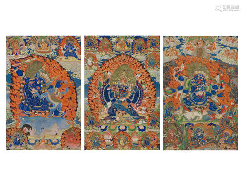 A GROUP OF THREE THANGKAS OF YAMA DHAMARAJA, VAJRABHAIRAVA, AND SHADBHUJA MAHAKLA TIBET, 19TH CENTURY