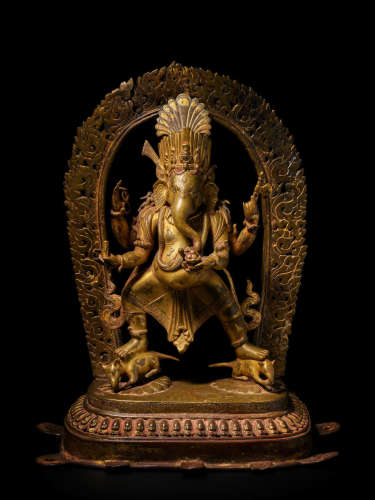 A GILT COPPER ALLOY SHRINE TO DANCING GANESHA NEPAL, DATED 1849 CE