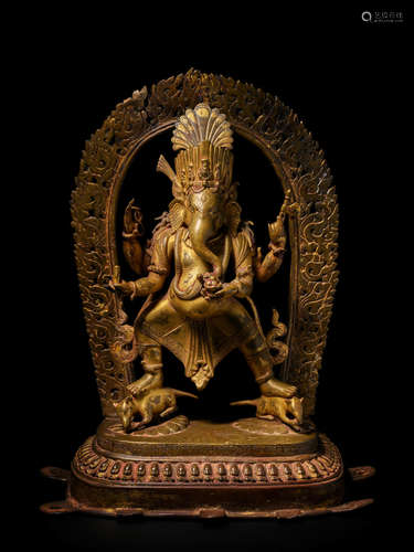 A GILT COPPER ALLOY SHRINE TO DANCING GANESHA NEPAL, DATED 1849 CE