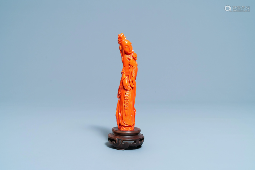 A Chinese carved red coral figure of a lady, 19/20th C.