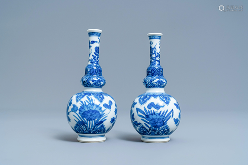 A pair of Chinese blue and white double gourd vases,