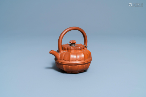 A Chinese Yixing stoneware chrysanthemum-shaped teapot