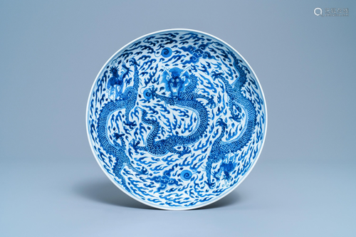 A Chinese blue and white 'dragon' dish, Kangxi mark and