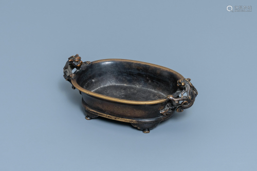 A Chinese chilong-handled bronze censer, Xuande mark,