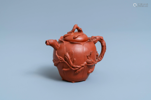 A Chinese Yixing stoneware lotus-shaped teapot and