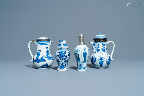 Two Chinese blue and white ewers and covers and two