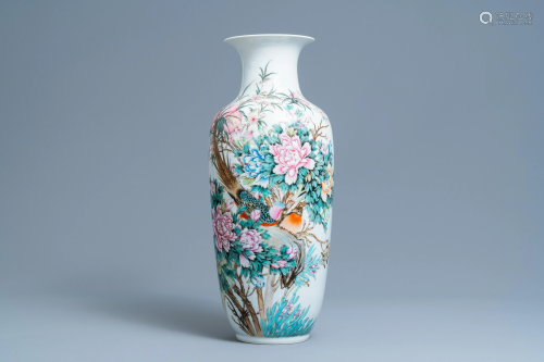 A Chinese famille rose vase with birds among blossoming