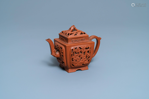 A Chinese reticulated Yixing stoneware teapot and