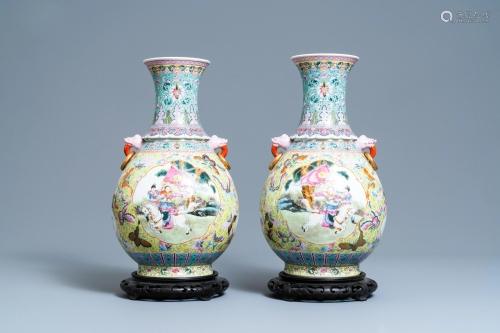 A pair of Chinese famille rose vases, Qianlong mark,