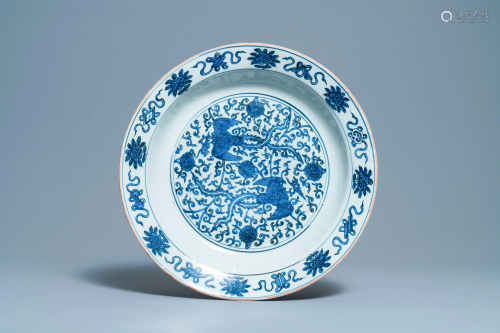 A large Chinese blue and white 'two phoenixes' dish,