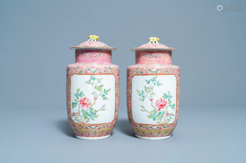 A pair of Chinese famille rose vases and covers,