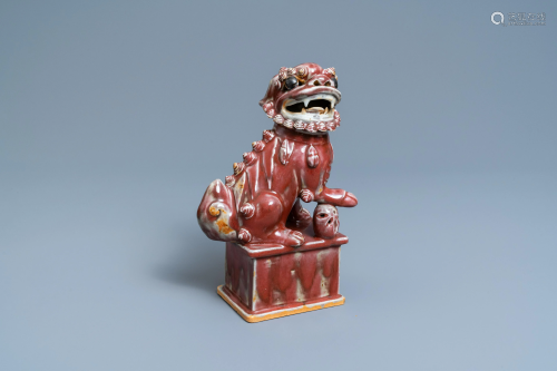 A Chinese monochrome sang de boeuf model of a Buddhist