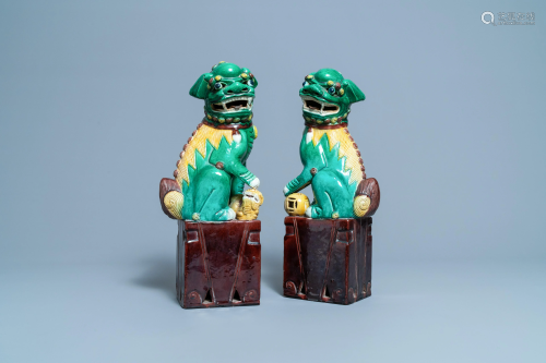 A pair of tall Chinese sancai-glazed biscuit models of