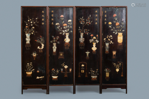 A Chinese lacquered wooden screen embellished with