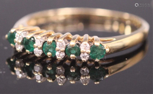 LADYS 14KT EMERALD AND DIAMOND RING