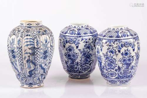 A lot consisting of (3) Delft vases, Holland, 19th century and later.