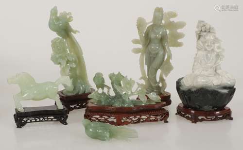 A lot of different sculptures in jade. China, 2nd half of the 20th century.