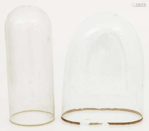 An oval glass bell jar, together with a round bell jar, various dimensions, 19th century.