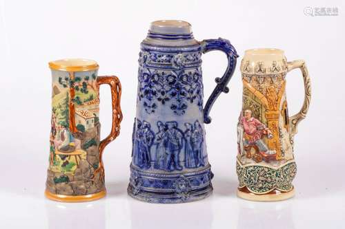 A lot comprising of two large beer-tankards and a 'Steinkrug', Bavaria, Germany, ca. 1900.