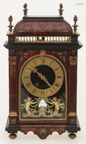 A Boulle-style wood table clock with bronze ornaments. France, ca. 1900.