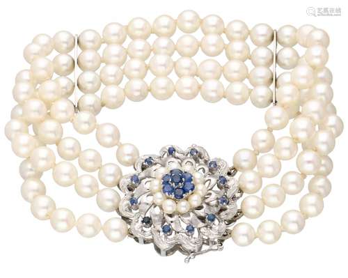 Four-row cultivated pearl bracelet with a white gold closure set with natural sapphire - 18 ct.