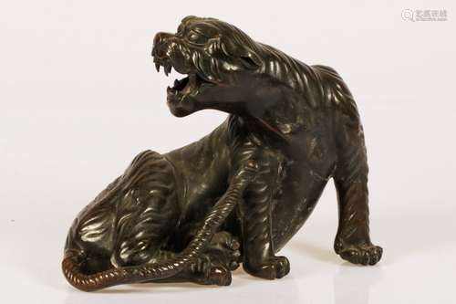 A bronze sculpture of a lioness, China, 1st half 20th century.