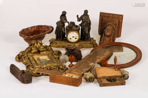 A large lot with various items, comprising of a pendulum, a cookie-mould, slipware and various decor