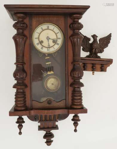 A wood regulator clock, Junghans, mid. 20th century. Meas. 90 x 39 cm.