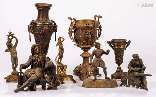 A lot with various vases and sculptures in brass and Zamak.