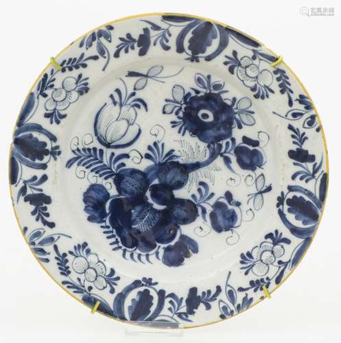 A Delft charger with blue and white decor, Dutch, 19th century.