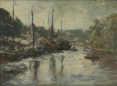 Attributed to Evert Moll, Cargovessels in a city harbour.