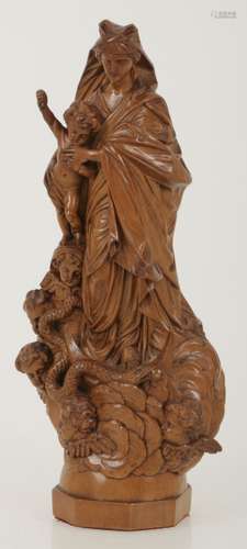 A wood sculpture of mother and child, Germany, late 19th century.