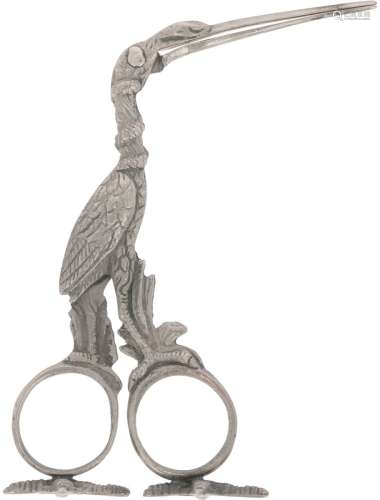 Diaper pliers (also called umbilical pliers) in the shape of a silver stork.