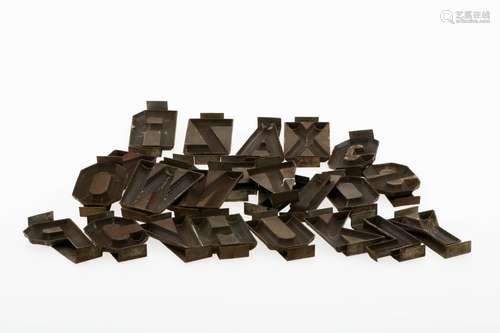 A lot consisting of chocolate letter shapes. The Netherlands, mid. 20th century.