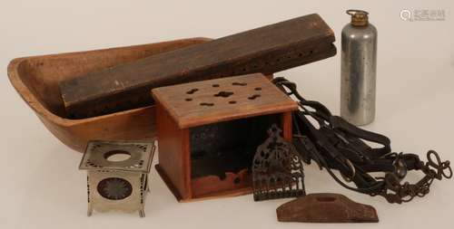 A lot of various items, a.w. a wooden manger, wooden cigar press mould and a foot warmer, 20th cent