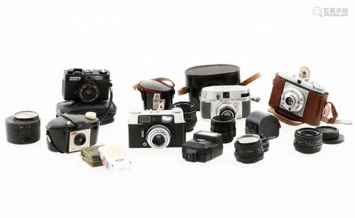 A lot with various photocameras and cameralenses, Germany, 20th century.