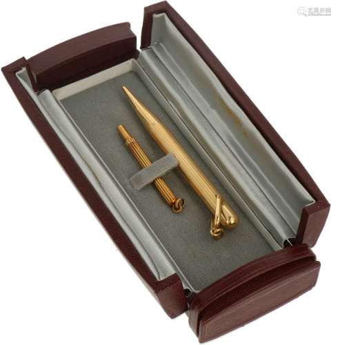 Vacheron et Constantin pencil case containing a gold pen and toothpick.