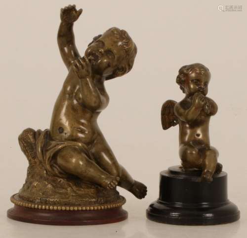 A lot of (2) bronze Putti. Approximately 1900.