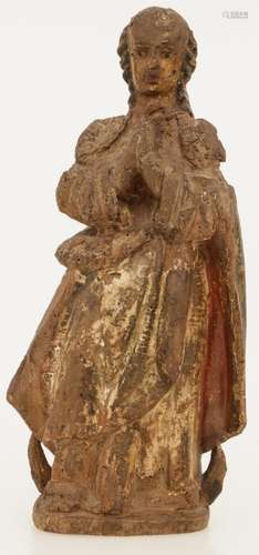 An antique carved statue of Saint Mary symbolising chastity, 17th Century or earlier.