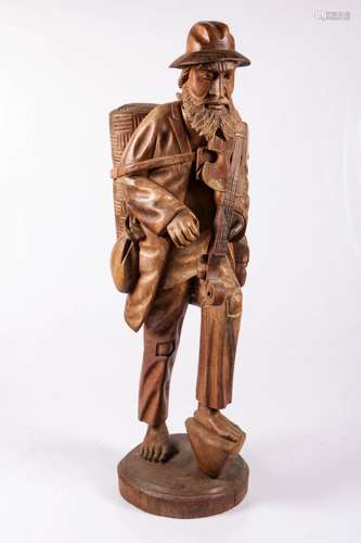 A carved wood Schwarzwald (Black Forest), sculpture of Vitalis, Germany, early 20th century.