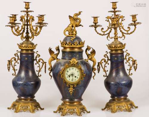 A (3) piece chimney set, Belgium, 1st half 20th century.