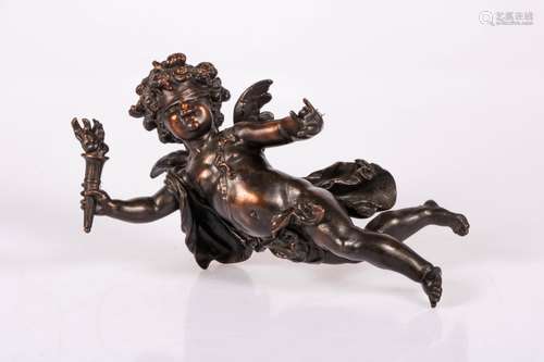 A bronze putto with a torch, France, 20th century.